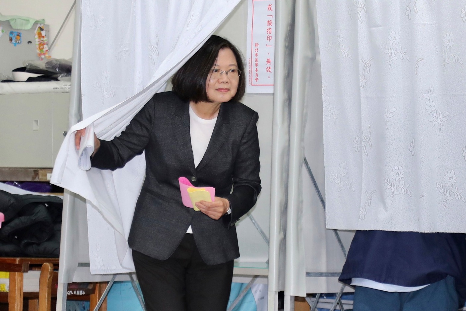 Anti-Beijing candidate re-elected to lead Taiwan. 